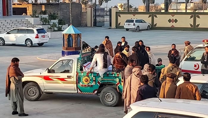 Relatives transport a dead body of a victim who was killed in Kurram district at a mosque in Parachinar, the mountainous Khyber Pakhtunkhwa province, on November 22, 2024. — AFP