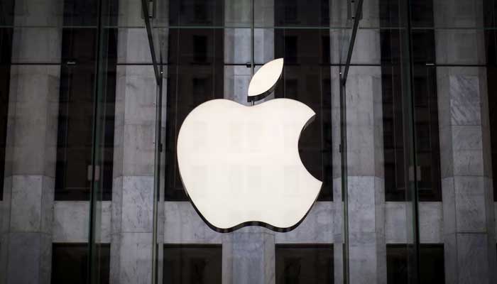 An Apple logo hangs above the entrance to the Apple store on 5th Avenue in the Manhattan borough of New York City, July 21, 2015. — Reuters