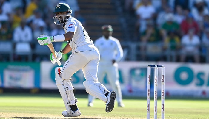 Pakistan´s Babar Azam watches the ball after playing a shot during the second day of the second Test cricket match between South Africa and Pakistan at Newlands stadium in Cape Town on January 4, 2025. — AFP