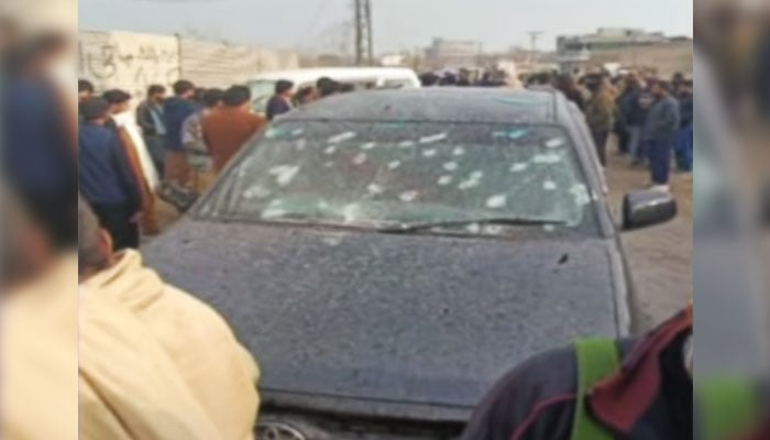 Bullet holes are visible on the widescreen of the vehicle the victims were travelling in on January 4, 2025. —YouTube/Geo News