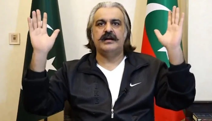 KP CM Ali Amin Gandapur gestures during a video link address to PTI workers on September 22, 2024. — Screengrab via Geo News