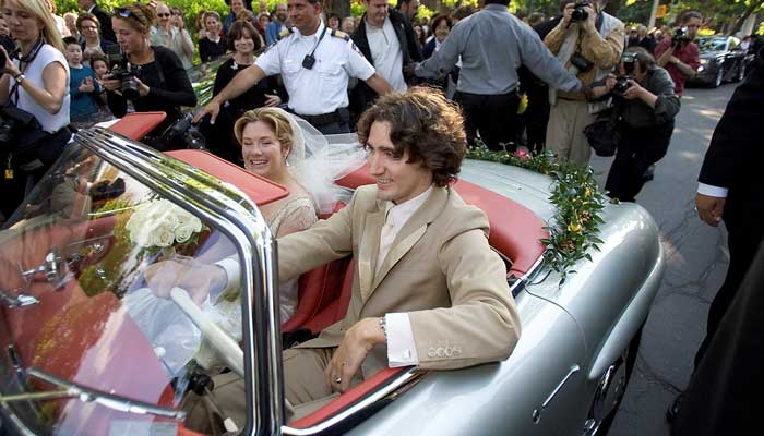 Justin Trudeau, son of the late Prime Minister Pierre Trudeau, and his new bride Sophie Gregoire leave following their wedding ceremony in his fathers 1959 Mercedes 300SL, in Montreal, Canada, May 28, 2005. — Reuters