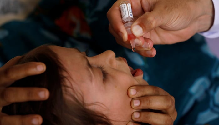 Polio vaccine drops are administered to a child at a civil dispensary in Peshawar, Pakistan July 11, 2019. — Reuters