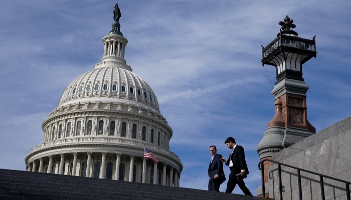 People walk past the U.S. Capitol building in Washington, U.S., November 15, 2023. — Reuters