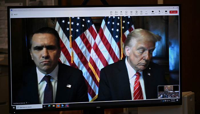 Todd Blanche (L) attorney of US President-elect Donald Trump are seen on the screen at Manhattan criminal court in New York, US, on Friday, January 10, 2025. — Reuters