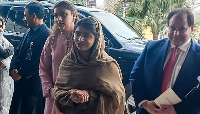 Nobel Peace Prize Laureate Malala Yousafzai (centre) arrives to attend an international summit on Girls Education in Muslim Communities, in Islamabad on January 11, 2025. — AFP