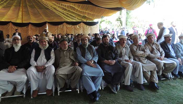 Participants of rival tribes attend grand jirga, organised in Kohat, in wake of deadly clashes in Kurram district, November 30, 2024. — Reporter