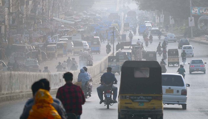 Commuters are pictured at Liaquatabad area in Karachi on January 6, 2025. — PPI