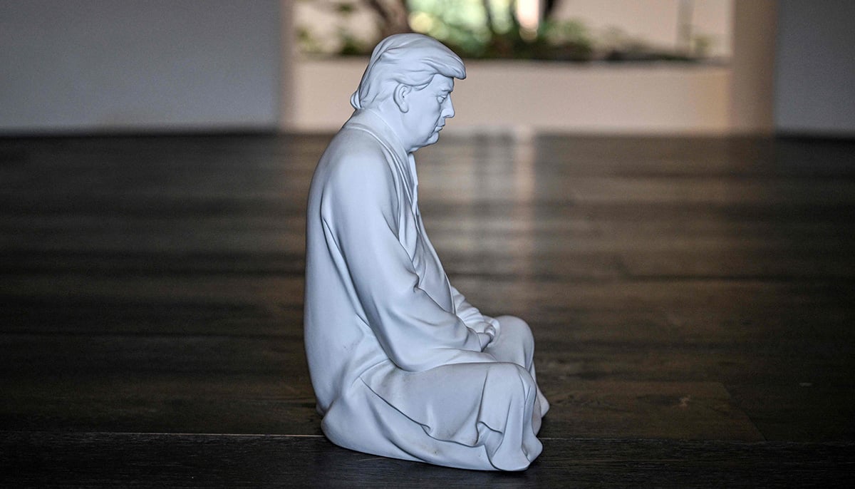 This photo taken on December 9, 2024 shows a sculpture of US president-elect Donald Trump in a pose evoking the Buddha at artist Hong Jinshis workshop in Xiamen, in southeastern Chinas Fujian province. — AFP