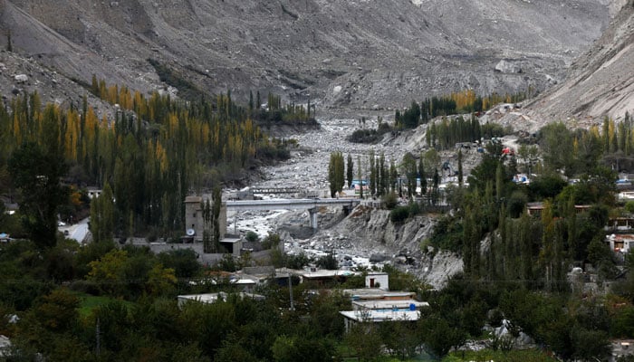 The Gamoo Bhr glacial lake pools in front of the Darkut glacier in Darkut village, Yasin valley, in the Gilgit-Baltistan region of Pakistan, October 11, 2023.  — Reuters