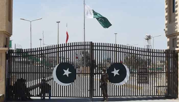 Pakistani soldiers stand guard at the closed Pakistan-Iran border in Taftan on February 25, 2020. — AFP