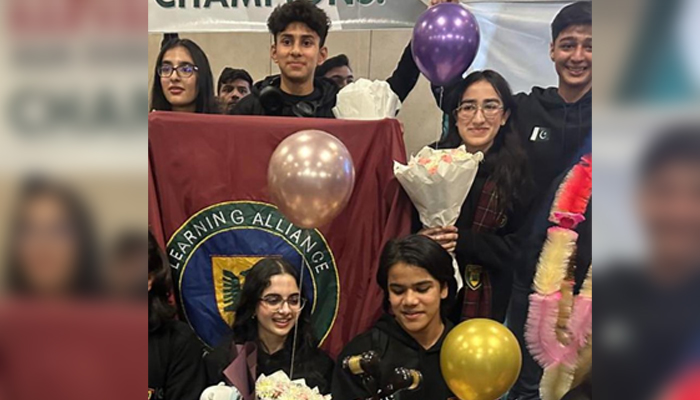 Pakistani youngster Shehram Wasi poses for a picture with his fellow delegates at Harvard MUN.