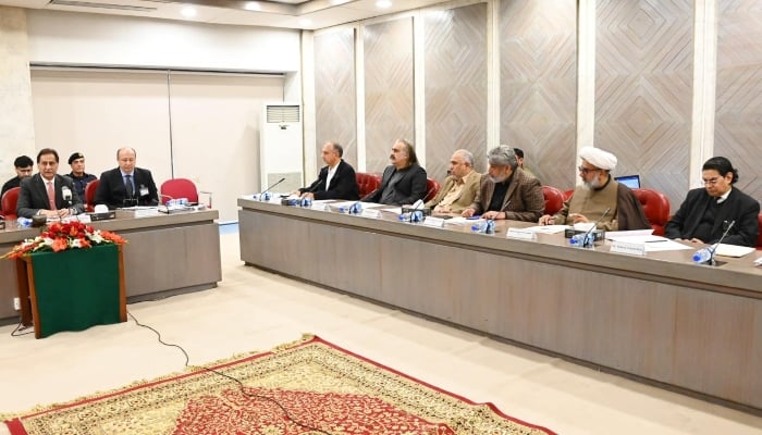 National Assembly Speaker Sardar Ayaz Sadiq (left) is chairing a meeting at the Parliament House in Islamabad while PTI members are listening to him on January 16, 2025. — Facebook/ @SardarAyazSadiq