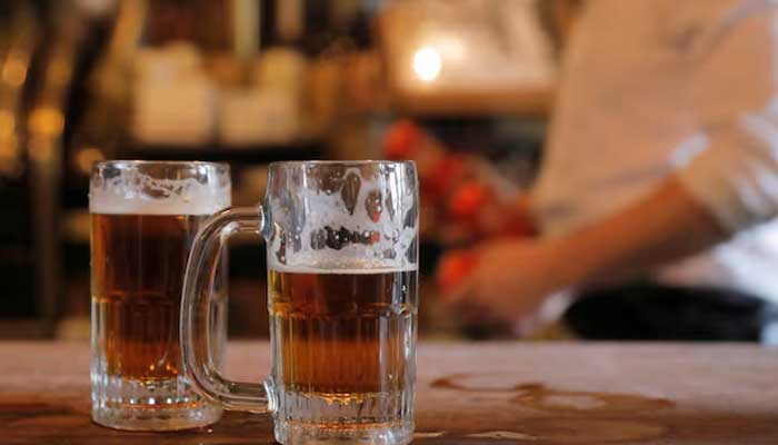 Beer sits on the bar in Manhattan, New York City, New York, US, May 3, 2021. — Reuters