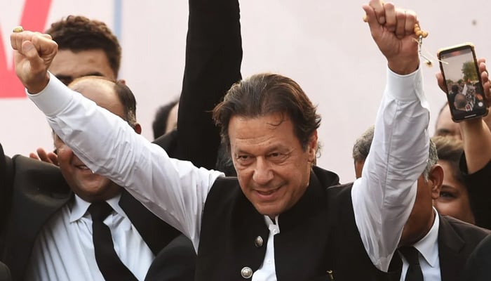 Former prime minister Imran Khan gestures in Lahore on September 21, 2022. — AFP