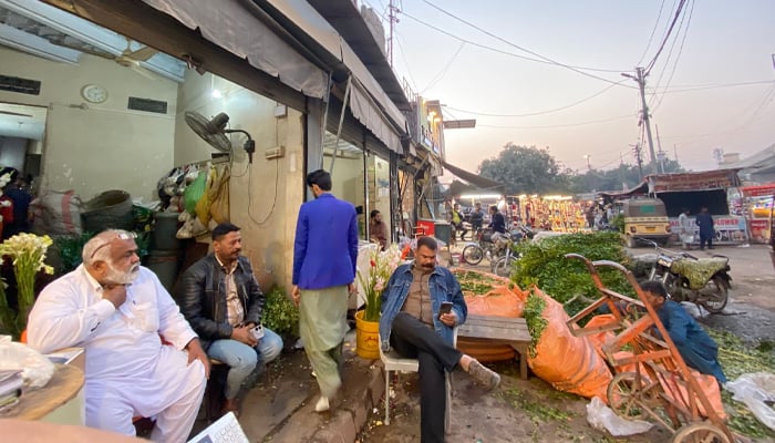 A bustling view of Karachi’s Wholesale Flower Market at Teen Hatti. — Reporter