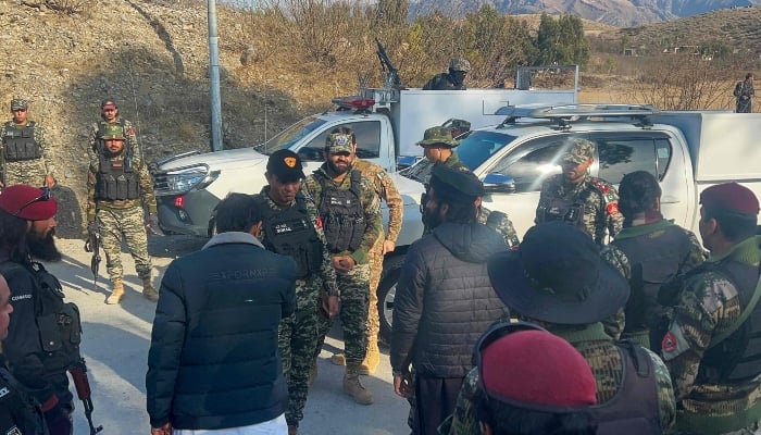 Frontier Constabulary and army personnel gather near the ambushed region in Kurram, northwest Pakistan on January 17, 2025. — AFP