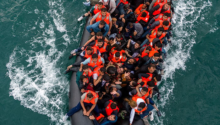 In this drone view an inflatable dinghy carrying migrants makes its way towards England in the English Channel, Britain, August 6, 2024. — Reuters