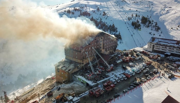 An aerial picture of a fire on the fourth floor of the 11-storey hotel in Bolus Kartalkaya ski resort on January 21, 2025. — AFP