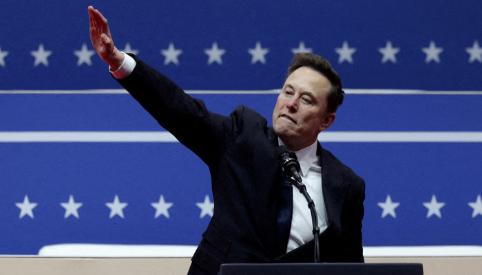 Elon Musk gestures at the podium inside the Capital One arena on the inauguration day of Donald Trumps second presidential term, in Washington, US, January 20, 2025. — Reuters