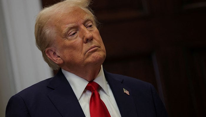 President Donald Trump stands after delivering remarks on AI infrastructure at the Roosevelt room at White House in Washington, US, January 21, 2025. — Reuters