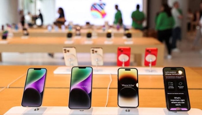 Apple iPhones are seen inside an Apple retail store in Mumbai, India, on April 17, 2023. — Reuters