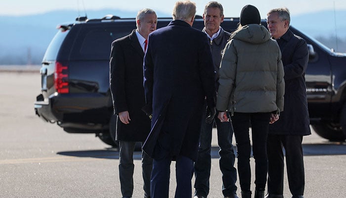 US President Donald Trump and first lady Melania Trump are welcomed by North Carolina Governor Josh Stein, Republican National Committee chairman Michael Whatley and Tennessee Governor Bill Lee, as they arrive to assess recovery efforts and tour areas devastated by Hurricane Helene, at Asheville Regional Airport in Asheville, North Carolina, US, January 24, 2025. — Reuters