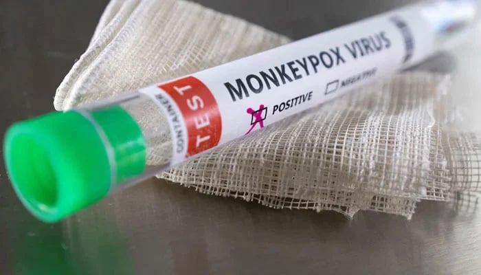 Test tube labelled Monkeypox virus positive are seen in this illustration. — Reuters/File