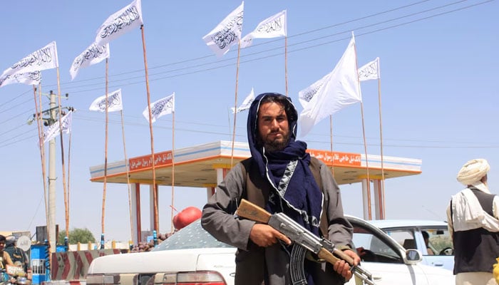 An Afghan Taliban fighter looks on as he stands at the city of Ghazni, Afghanistan August 14, 2021. — Reuters