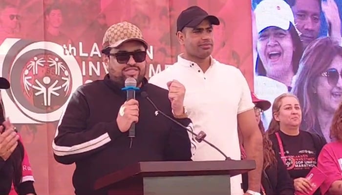 Sindh Governor Kamran Tessori addressing the media alongside Olympic gold medalist Arshad Nadeem in Karachi, January 26, 2025, in this still taken from a video. — Reporter