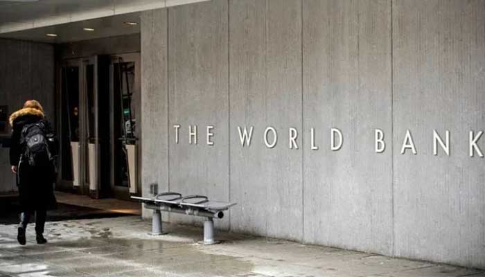 One person enters the building of the global development organization based in Washington, the World Bank group, in Washington. - AFP/File