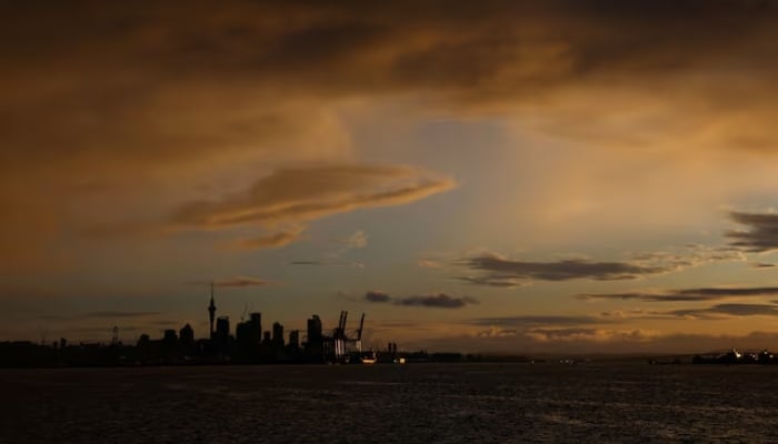 The Auckland skyline is seen at sunset in New Zealand on August 12, 2023. — Reuters