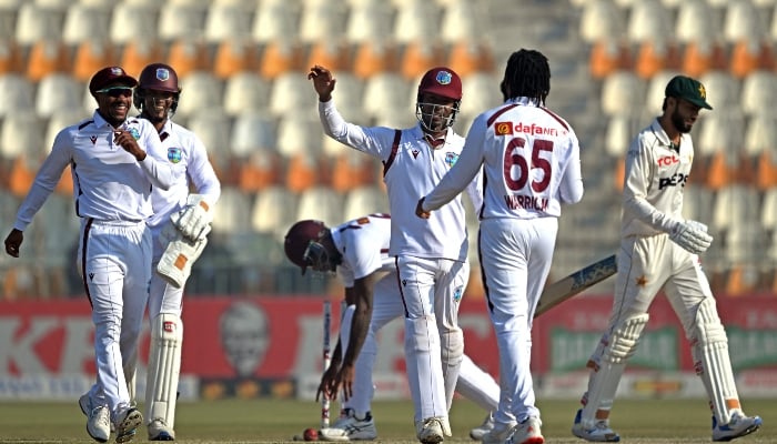 West Indies players celebrate the dismissal of Pakistans Kashif Ali (right) during the third day of the second Test between Pakistan and West Indies at the Multan Cricket Stadium in Multan on January 27, 2025. — AFP