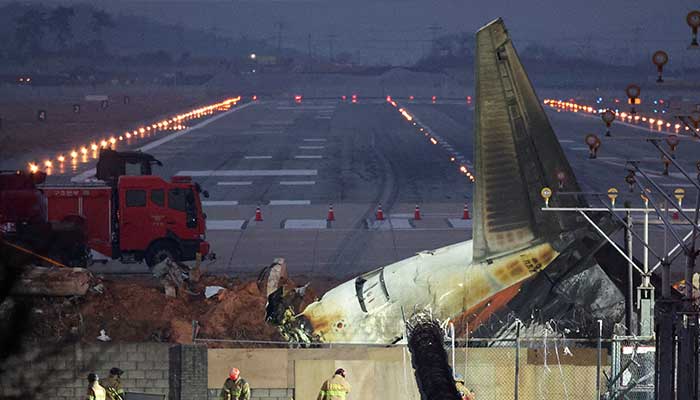 Rescuers work near the wreckage of the Jeju Air aircraft that went off the runway and crashed at Muan International Airport, in Muan, South Korea, December 30, 2024. — Reuters