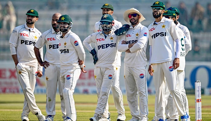 Pakistan´s players wait for the third umpire decision against West Indies´ Amir Jangoo during the second day of the second Test cricket match between Pakistan and West Indies at the Multan Cricket Stadium in Multan on January 26, 2025. — AFP