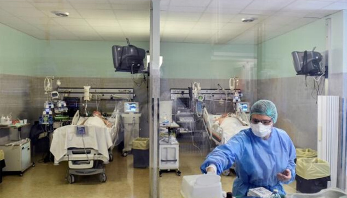 A medic is seen working inside an intensive care unit in this undated image. — AFP