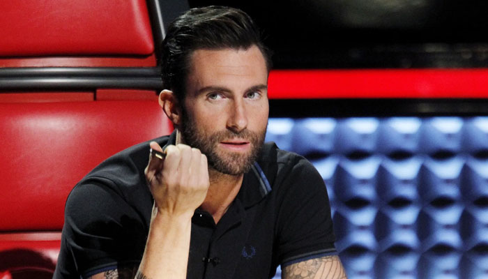 Adam Levine looks back at his iconic moments on The Voice