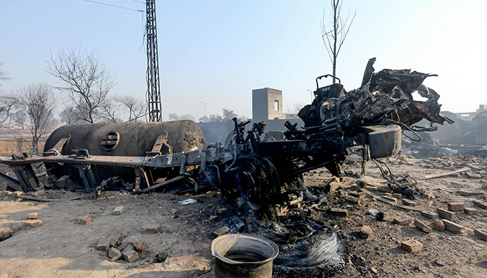 An LPG tanker truck lies charred after it exploded near an industrial area in Multan on January 27, 2025. — AFP