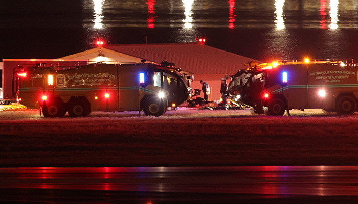 Emergency personnel work near the site of the crash after American Eagle flight 5342 collided with a Black Hawk helicopter while approaching Reagan Washington National Airport and crashed into the Potomac River, outside Washington, US, January 30, 2025. — Reuters