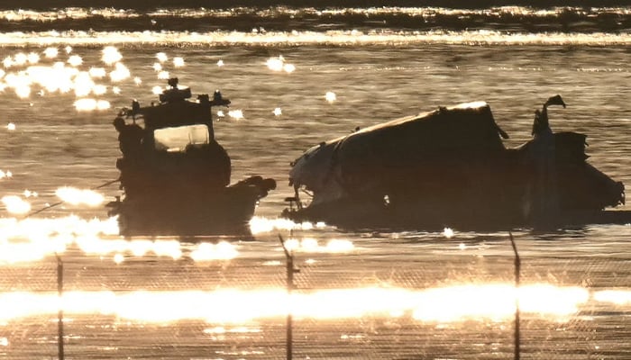 Part of the wreckage is seen as rescue crews search the waters of the Potomac River after a passenger plane on approach to Reagan National Airport crashed into the river after colliding with a US Army helicopter, near Washington, DC, on January 30, 2025. — AFP