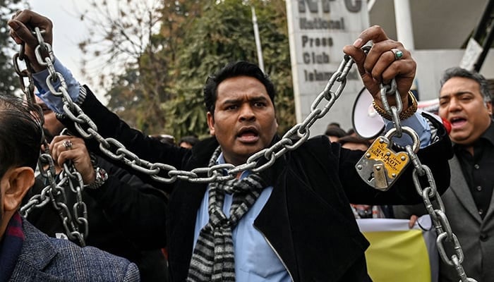 A member of the Pakistan Federal Union of Journalists demonstrates during a protest against amendments in the Prevention of Electronic Crimes Act (PECA) in Islamabad on January 28, 2025. — AFP