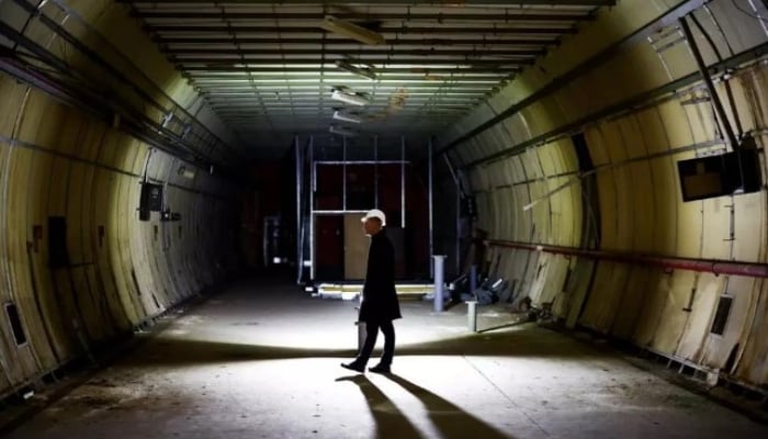 A worker in The London Tunnels in London in this undated image. — AFP