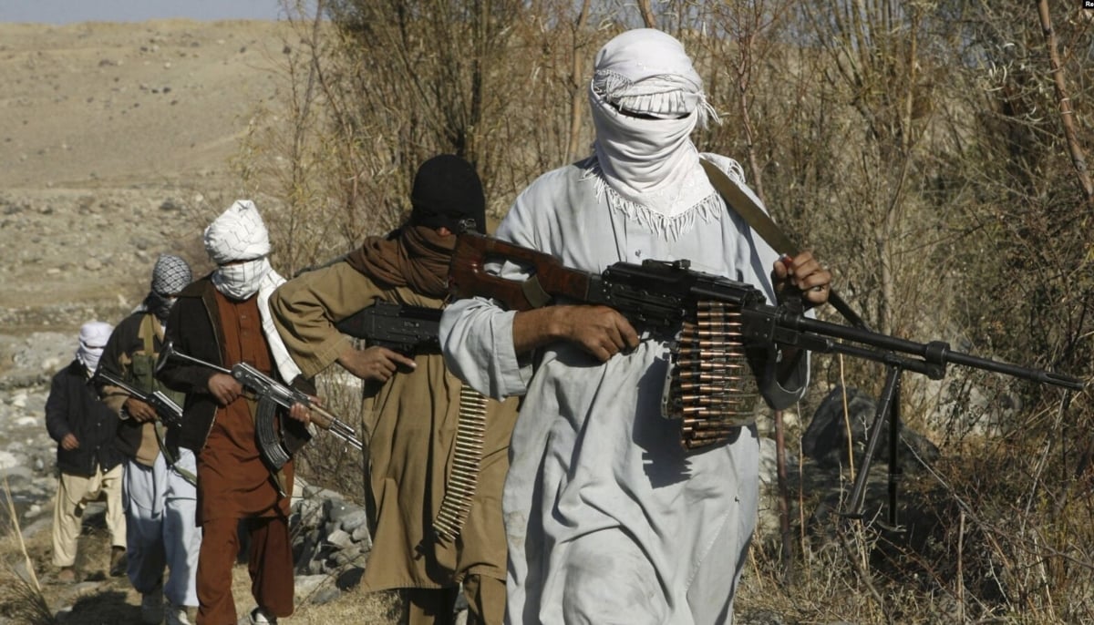 Taliban fighters pose with their weapons in Afghanistans Nangarhar Province. — Reuters/File