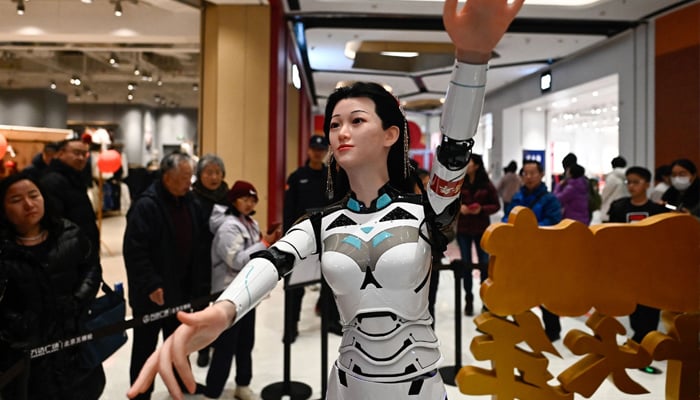 A humanoid robot is seen during the Spring Festival Science and Technology Temple Fair in Beijing on January 31, 2025. — AFP