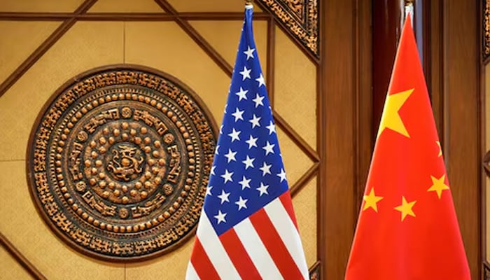 Flags of the US and China sit in a room where former US secretary of state Antony Blinken meets Chinas Minister of Public Security Wang Xiaohong (not in the picture) at the Diaoyutai State Guesthouse, April 26, 2024, in Beijing, China. — Reuters