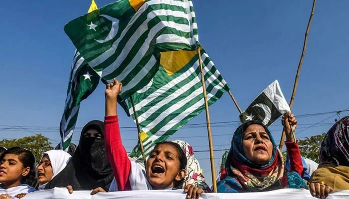 Protesters hold Kashmiri flags on the Kashmir Solidarity Day in Karachi. — AFP/File