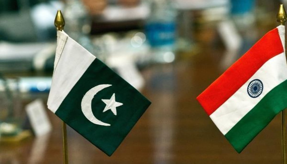 A representational image of Pakistan and Indias flags during a diplomatic meeting. — AFP/File