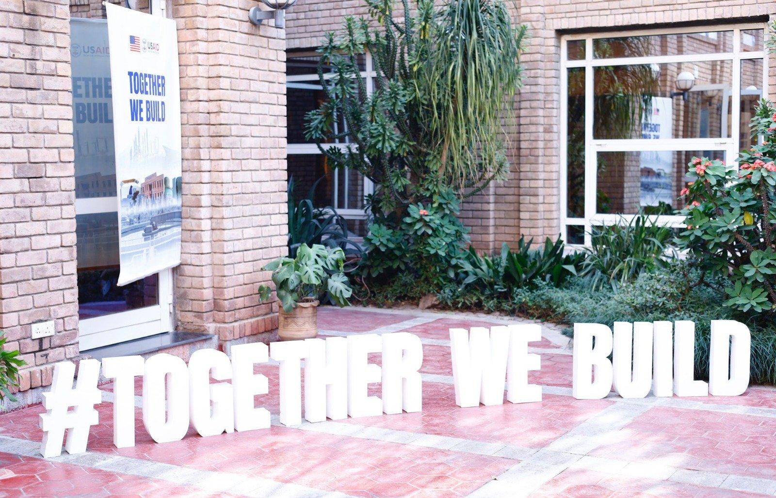 This undated image shows the USAID conference title, made of standing foam letters, prominently displayed outside the venue. — Facebook/@USAIDPakistan/File