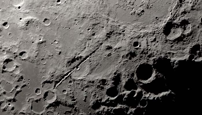 Two grand canyons on the moon radiating from the Schroedinger impact basin near the lunar south pole on the lunar far side are seen in this undated image using data obtained by NASAs robotic Lunar Reconnaissance Orbiter spacecraft. — Reuters