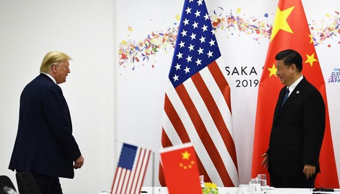 Chinese President Xi Jinping and US President Donald Trump in Osaka in 2019. — AFP/File